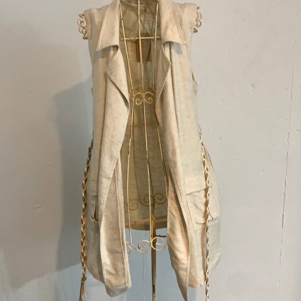 Tan pocket long vest. Size medium